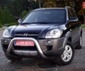 Черный Хендай Туксон, объемом двигателя 2 л и пробегом 230 тыс. км за 8600 $, фото 91 на Automoto.ua