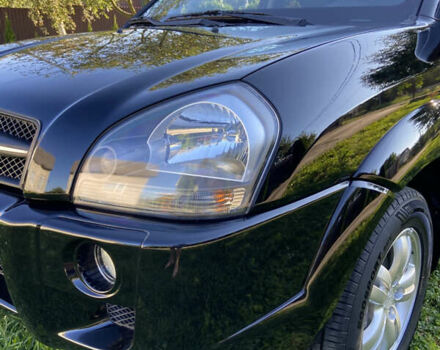 Черный Хендай Туксон, объемом двигателя 1.98 л и пробегом 197 тыс. км за 8000 $, фото 14 на Automoto.ua