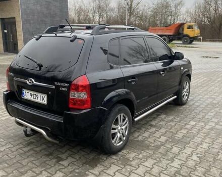 Чорний Хендай Туксон, об'ємом двигуна 1.99 л та пробігом 345 тис. км за 7600 $, фото 5 на Automoto.ua