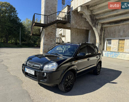 Черный Хендай Туксон, объемом двигателя 2 л и пробегом 189 тыс. км за 8250 $, фото 10 на Automoto.ua