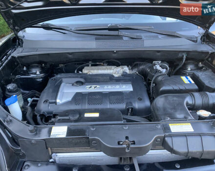 Чорний Хендай Туксон, об'ємом двигуна 2 л та пробігом 56 тис. км за 9500 $, фото 26 на Automoto.ua