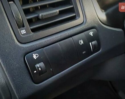 Черный Хендай Туксон, объемом двигателя 2 л и пробегом 230 тыс. км за 8600 $, фото 162 на Automoto.ua