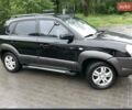 Черный Хендай Туксон, объемом двигателя 1.98 л и пробегом 193 тыс. км за 8000 $, фото 1 на Automoto.ua