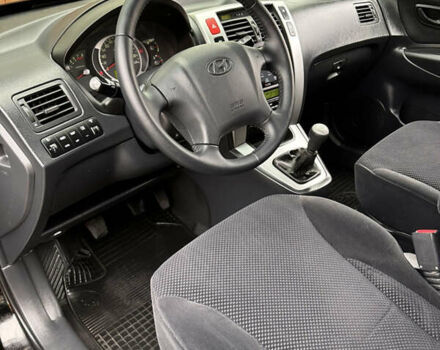 Хендай Туксон 2007 в Ужгороде на Automoto.ua Черный Хендай Туксон, объемом двигателя 1.98 л и пробегом 157 тыс. км за 7300 $, фото 41 на Automoto.ua