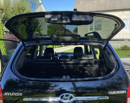 Черный Хендай Туксон, объемом двигателя 1.98 л и пробегом 197 тыс. км за 8000 $, фото 25 на Automoto.ua