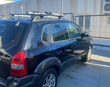 Чорний Хендай Туксон, об'ємом двигуна 1.98 л та пробігом 215 тис. км за 7540 $, фото 4 на Automoto.ua