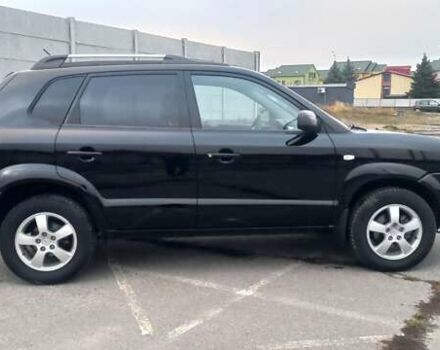 Черный Хендай Туксон, объемом двигателя 1.98 л и пробегом 155 тыс. км за 7999 $, фото 6 на Automoto.ua