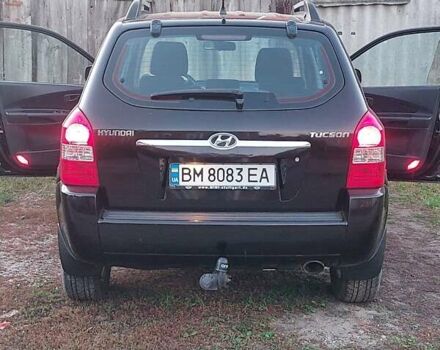 Черный Хендай Туксон, объемом двигателя 1.98 л и пробегом 200 тыс. км за 7100 $, фото 7 на Automoto.ua