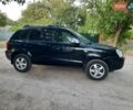 Черный Хендай Туксон, объемом двигателя 2 л и пробегом 219 тыс. км за 7990 $, фото 27 на Automoto.ua