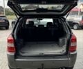 Черный Хендай Туксон, объемом двигателя 2 л и пробегом 232 тыс. км за 8900 $, фото 5 на Automoto.ua