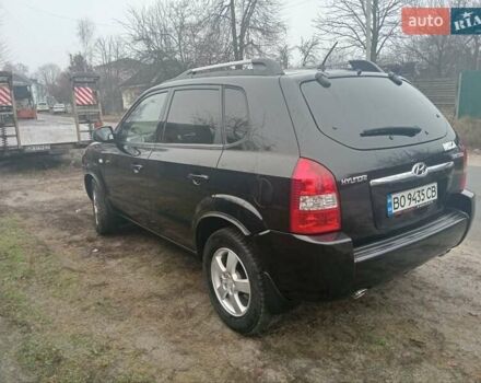 Черный Хендай Туксон, объемом двигателя 1.99 л и пробегом 235 тыс. км за 9000 $, фото 4 на Automoto.ua