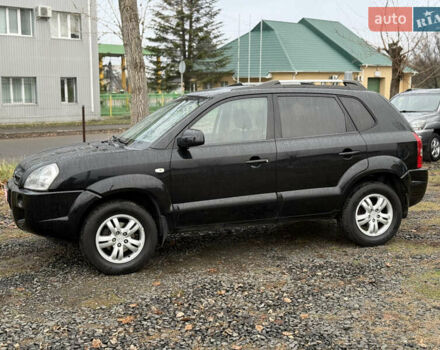 Чорний Хендай Туксон, об'ємом двигуна 2 л та пробігом 196 тис. км за 7250 $, фото 9 на Automoto.ua