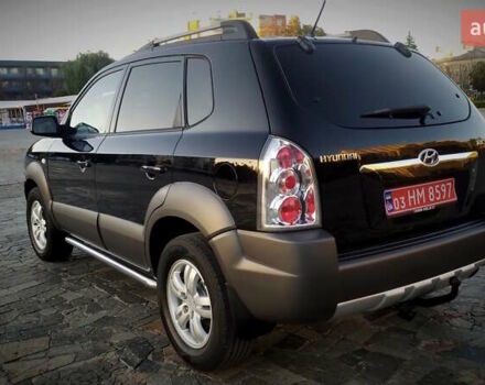 Черный Хендай Туксон, объемом двигателя 2 л и пробегом 230 тыс. км за 8600 $, фото 14 на Automoto.ua