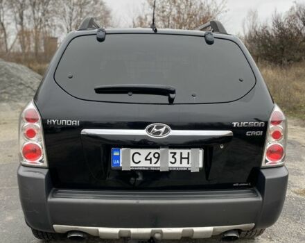 Черный Хендай Туксон, объемом двигателя 2 л и пробегом 330 тыс. км за 4350 $, фото 6 на Automoto.ua