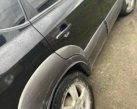 Чорний Хендай Туксон, об'ємом двигуна 2 л та пробігом 230 тис. км за 5999 $, фото 4 на Automoto.ua