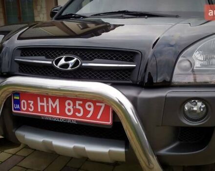 Чорний Хендай Туксон, об'ємом двигуна 2 л та пробігом 229 тис. км за 8600 $, фото 60 на Automoto.ua