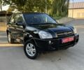 Черный Хендай Туксон, объемом двигателя 2 л и пробегом 180 тыс. км за 7800 $, фото 1 на Automoto.ua