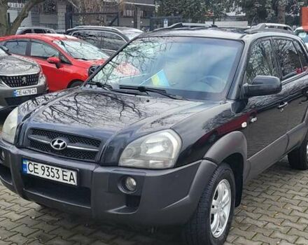 Черный Хендай Туксон, объемом двигателя 2 л и пробегом 230 тыс. км за 7700 $, фото 3 на Automoto.ua