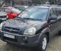 Черный Хендай Туксон, объемом двигателя 2 л и пробегом 230 тыс. км за 7700 $, фото 3 на Automoto.ua