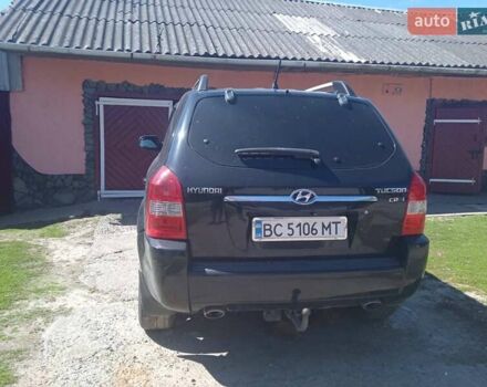 Черный Хендай Туксон, объемом двигателя 1.98 л и пробегом 222 тыс. км за 8200 $, фото 3 на Automoto.ua