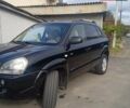 Чорний Хендай Туксон, об'ємом двигуна 1.99 л та пробігом 229 тис. км за 8199 $, фото 8 на Automoto.ua
