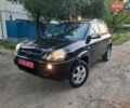 Черный Хендай Туксон, объемом двигателя 2 л и пробегом 219 тыс. км за 7990 $, фото 114 на Automoto.ua