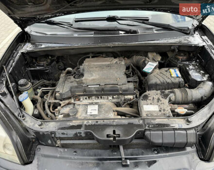 Черный Хендай Туксон, объемом двигателя 2 л и пробегом 182 тыс. км за 6999 $, фото 16 на Automoto.ua