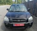 Чорний Хендай Туксон, об'ємом двигуна 2 л та пробігом 205 тис. км за 7650 $, фото 1 на Automoto.ua
