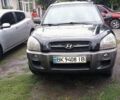 Чорний Хендай Туксон, об'ємом двигуна 2 л та пробігом 241 тис. км за 6299 $, фото 1 на Automoto.ua