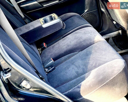 Черный Хендай Туксон, объемом двигателя 2 л и пробегом 167 тыс. км за 7800 $, фото 5 на Automoto.ua