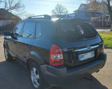 Черный Хендай Туксон, объемом двигателя 2 л и пробегом 227 тыс. км за 7300 $, фото 2 на Automoto.ua