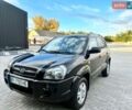 Черный Хендай Туксон, объемом двигателя 1.98 л и пробегом 210 тыс. км за 7599 $, фото 1 на Automoto.ua