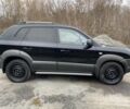 Черный Хендай Туксон, объемом двигателя 2 л и пробегом 330 тыс. км за 4350 $, фото 8 на Automoto.ua