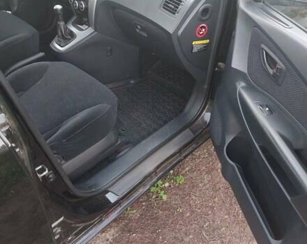 Черный Хендай Туксон, объемом двигателя 1.98 л и пробегом 200 тыс. км за 7100 $, фото 10 на Automoto.ua