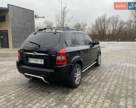 Чорний Хендай Туксон, об'ємом двигуна 1.99 л та пробігом 345 тис. км за 7600 $, фото 10 на Automoto.ua