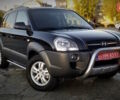 Черный Хендай Туксон, объемом двигателя 2 л и пробегом 230 тыс. км за 8600 $, фото 1 на Automoto.ua