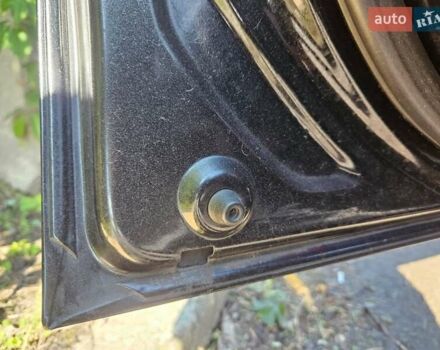 Чорний Хендай Туксон, об'ємом двигуна 2 л та пробігом 152 тис. км за 7950 $, фото 7 на Automoto.ua