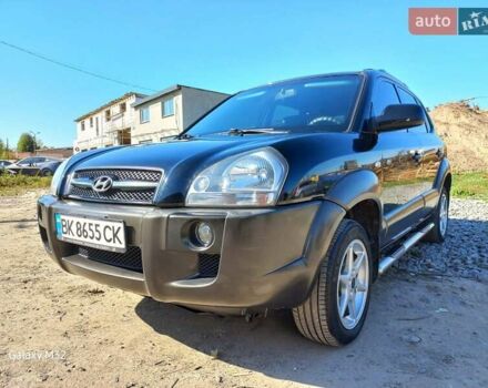 Черный Хендай Туксон, объемом двигателя 2 л и пробегом 219 тыс. км за 8500 $, фото 8 на Automoto.ua