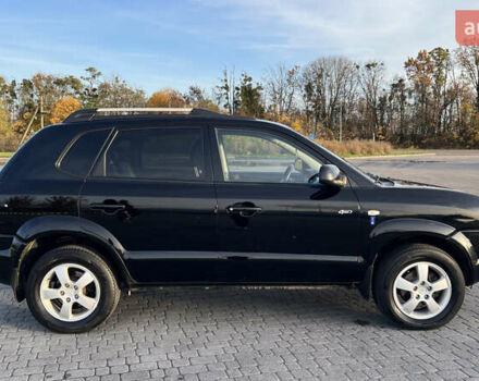 Черный Хендай Туксон, объемом двигателя 1.98 л и пробегом 243 тыс. км за 8500 $, фото 10 на Automoto.ua