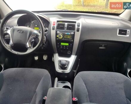 Черный Хендай Туксон, объемом двигателя 2 л и пробегом 270 тыс. км за 6800 $, фото 20 на Automoto.ua