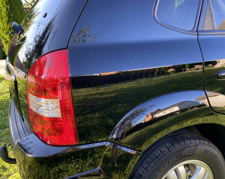 Черный Хендай Туксон, объемом двигателя 1.98 л и пробегом 197 тыс. км за 8000 $, фото 12 на Automoto.ua