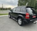 Черный Хендай Туксон, объемом двигателя 2 л и пробегом 199 тыс. км за 7820 $, фото 3 на Automoto.ua