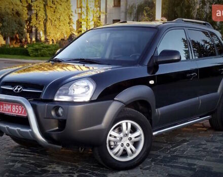 Черный Хендай Туксон, объемом двигателя 2 л и пробегом 230 тыс. км за 8600 $, фото 8 на Automoto.ua