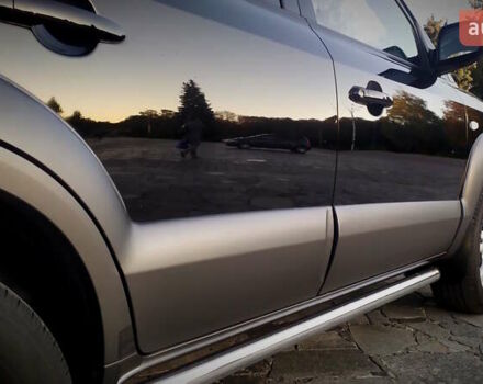 Черный Хендай Туксон, объемом двигателя 2 л и пробегом 230 тыс. км за 8600 $, фото 64 на Automoto.ua