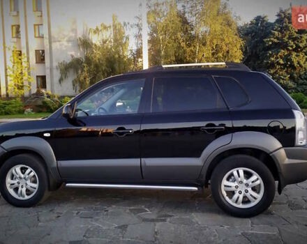 Черный Хендай Туксон, объемом двигателя 2 л и пробегом 230 тыс. км за 8600 $, фото 6 на Automoto.ua