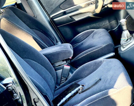 Черный Хендай Туксон, объемом двигателя 2 л и пробегом 167 тыс. км за 7800 $, фото 4 на Automoto.ua