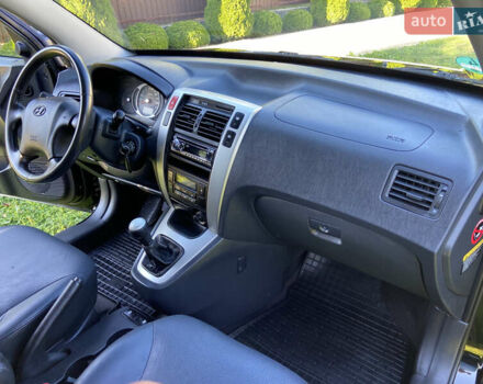 Черный Хендай Туксон, объемом двигателя 1.98 л и пробегом 197 тыс. км за 8000 $, фото 35 на Automoto.ua