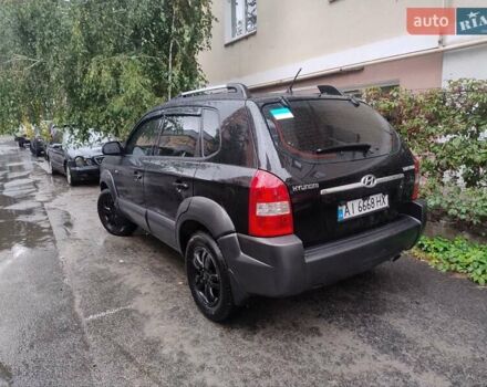 Чорний Хендай Туксон, об'ємом двигуна 1.98 л та пробігом 234 тис. км за 8000 $, фото 5 на Automoto.ua