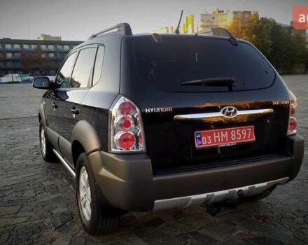 Черный Хендай Туксон, объемом двигателя 2 л и пробегом 230 тыс. км за 8600 $, фото 15 на Automoto.ua