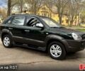 Черный Хендай Туксон, объемом двигателя 2 л и пробегом 105 тыс. км за 9300 $, фото 1 на Automoto.ua